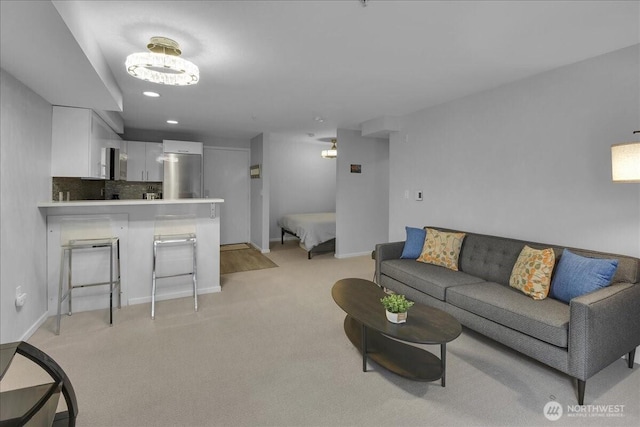 425 Vine St Unit 614, Seattle, WA 98121 - living room with light carpet and recessed lighting