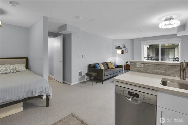 425 Vine St Unit 614, Seattle, WA 98121 - bedroom featuring a sink and light carpet