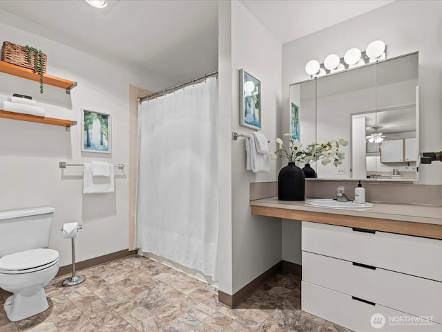 5225 50th Ave NE Unit 103, Seattle, WA 98105 - bathroom featuring vanity, a shower with curtain, and a ceiling fan