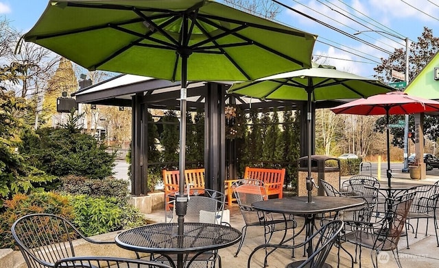 5225 50th Ave NE Unit 103, Seattle, WA 98105 - view of patio / terrace featuring outdoor dining space