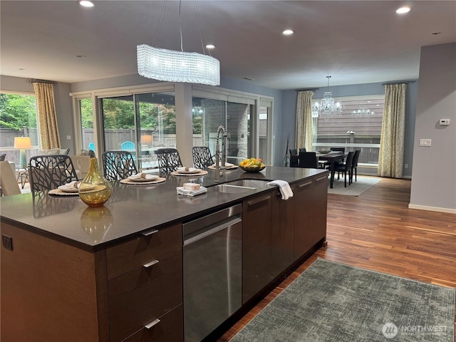 16486 SE 46th Ct, Bellevue, WA 98006 - kitchen with stainless steel dishwasher, a chandelier, modern cabinets, dark wood-style floors, and a center island with sink