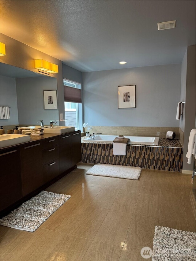 16486 SE 46th Ct, Bellevue, WA 98006 - bathroom featuring a bath and double vanity