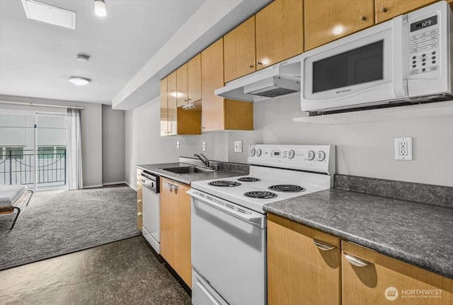 425 Vine St Unit 421, Seattle, WA 98121 - kitchen featuring white appliances, under cabinet range hood, dark countertops, and brown cabinetry