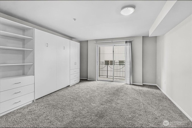 425 Vine St Unit 421, Seattle, WA 98121 - unfurnished bedroom with carpet floors and access to outside