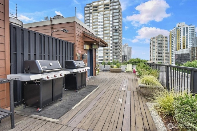 425 Vine St Unit 421, Seattle, WA 98121 - wooden terrace with grilling area and a view of city