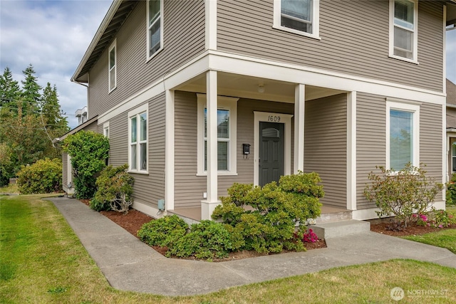 1609 Humboldt St, Bellingham, WA 98225 - view of exterior entry with a lawn