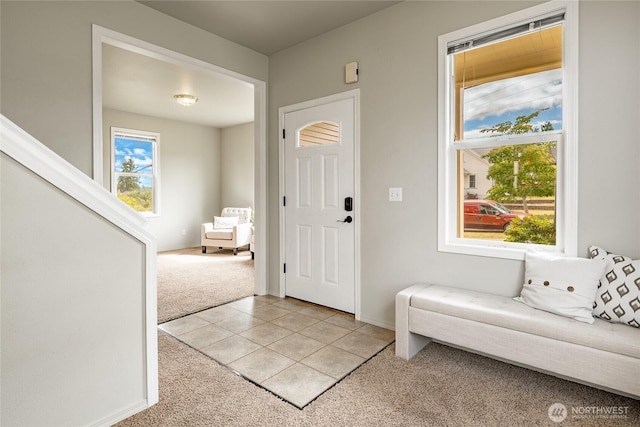 1609 Humboldt St, Bellingham, WA 98225 - entrance foyer featuring light carpet and light tile patterned flooring