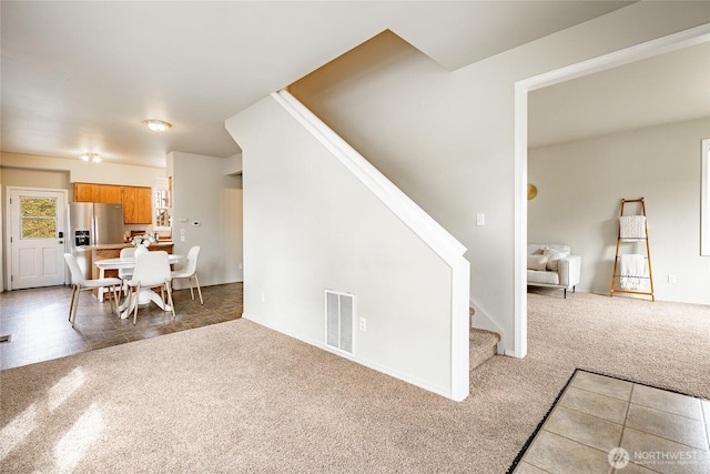 1609 Humboldt St, Bellingham, WA 98225 - dining space featuring carpet floors and stairs