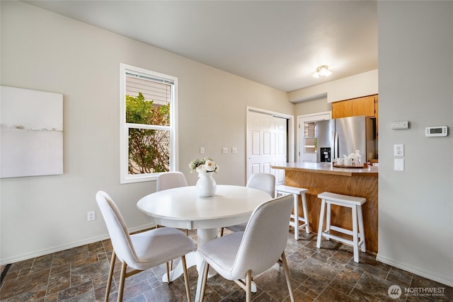 1609 Humboldt St, Bellingham, WA 98225 - dining space with dark stone finish flooring and baseboards