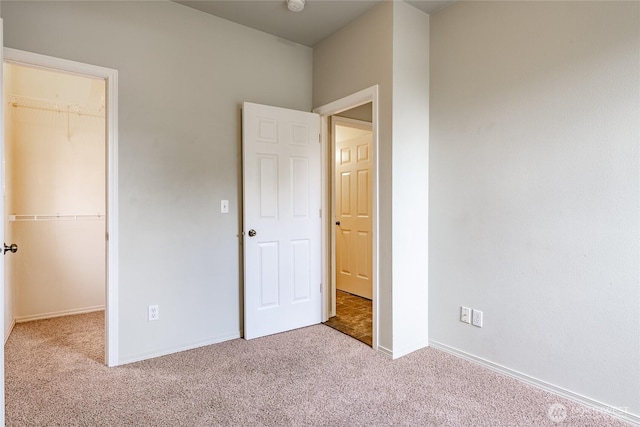 1609 Humboldt St, Bellingham, WA 98225 - unfurnished bedroom with carpet floors and a walk in closet