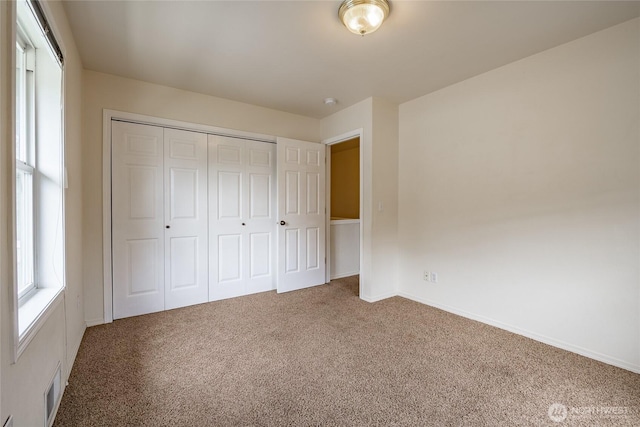 1609 Humboldt St, Bellingham, WA 98225 - unfurnished bedroom featuring carpet and a closet