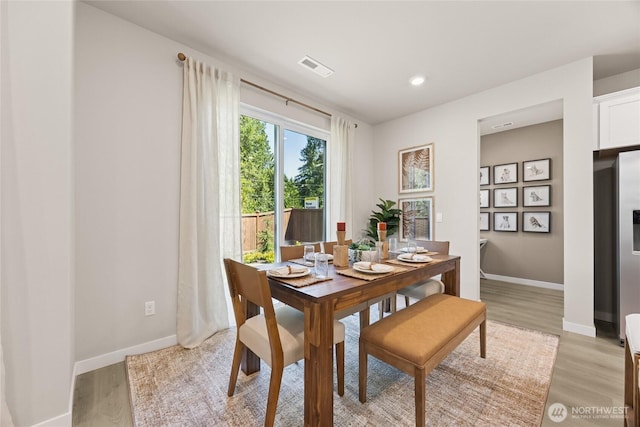 26808 NE 143rd Cir Unit 25, Duvall, WA 98019 - dining area featuring light wood-style floors and recessed lighting