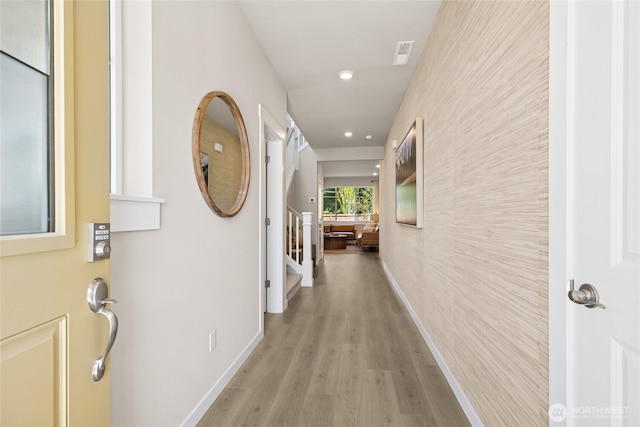 26808 NE 143rd Cir Unit 25, Duvall, WA 98019 - corridor featuring wood finished floors, recessed lighting, and stairway