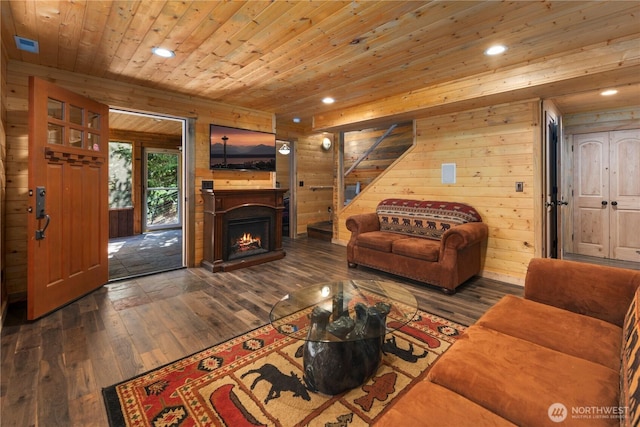 7189 Icicle Rd, Leavenworth, WA 98826 - living area with wooden ceiling, hardwood / wood-style flooring, stairs, wooden walls, and recessed lighting