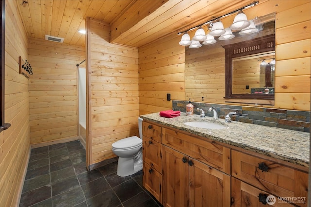 7189 Icicle Rd, Leavenworth, WA 98826 - full bath with wooden ceiling, wood walls, vanity, and bathtub / shower combination