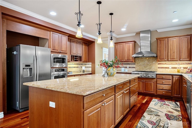 15025 SE 43rd St, Bellevue, WA 98006 - kitchen featuring appliances with stainless steel finishes, wall chimney exhaust hood, a kitchen island, dark wood-style floors, and crown molding