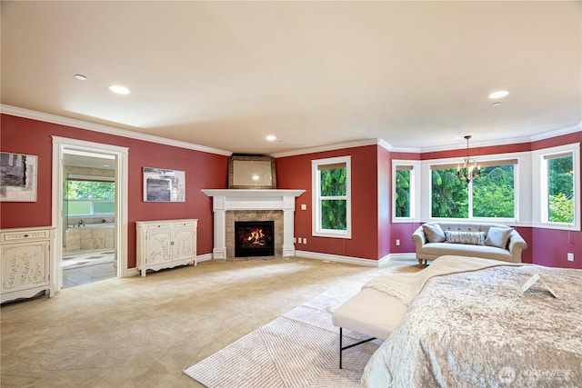 15025 SE 43rd St, Bellevue, WA 98006 - bedroom featuring ornamental molding, light colored carpet, recessed lighting, a tile fireplace, and a chandelier