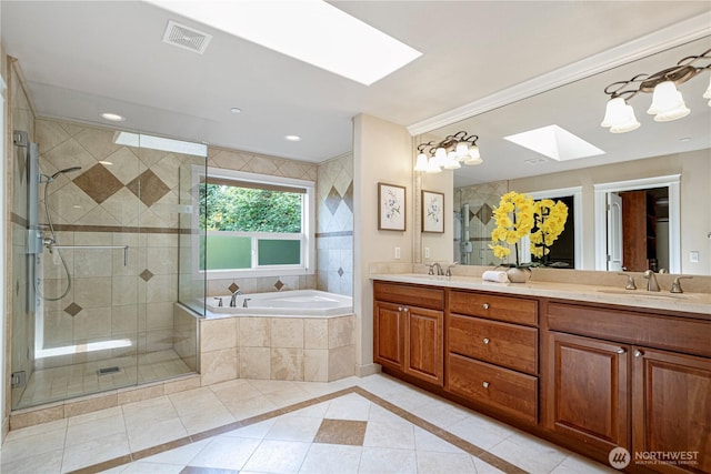15025 SE 43rd St, Bellevue, WA 98006 - full bath featuring a skylight, double vanity, a garden tub, tile patterned floors, and a stall shower