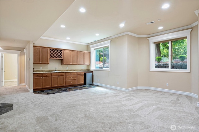15025 SE 43rd St, Bellevue, WA 98006 - kitchen with light colored carpet, ornamental molding, recessed lighting, light countertops, and open floor plan
