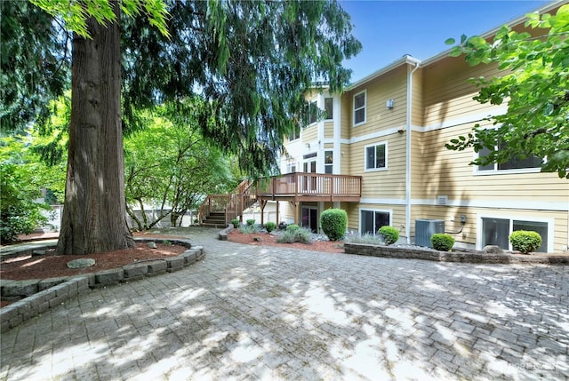 15025 SE 43rd St, Bellevue, WA 98006 - view of home's community featuring stairway, a wooden deck, and a patio