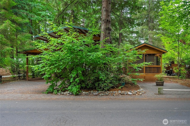 1546 Reservation Rd SE Unit 62, Olympia, WA 98513 - rustic home featuring driveway