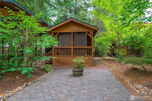 1546 Reservation Rd SE Unit 62, Olympia, WA 98513 - view of outbuilding featuring a sunroom