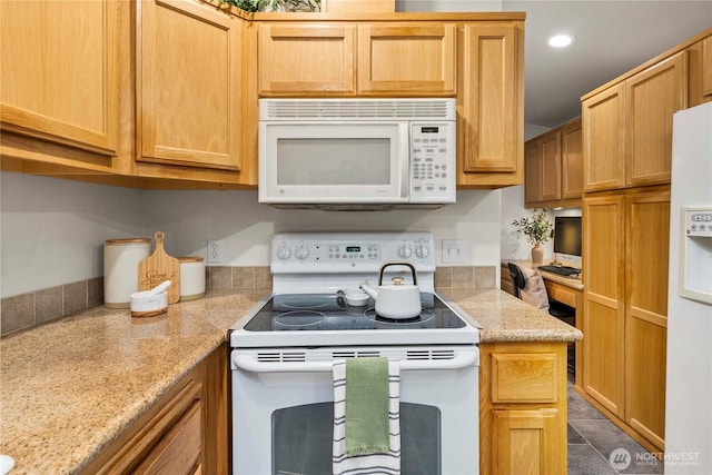 1546 Reservation Rd SE Unit 62, Olympia, WA 98513 - kitchen with white appliances, recessed lighting, and light stone countertops