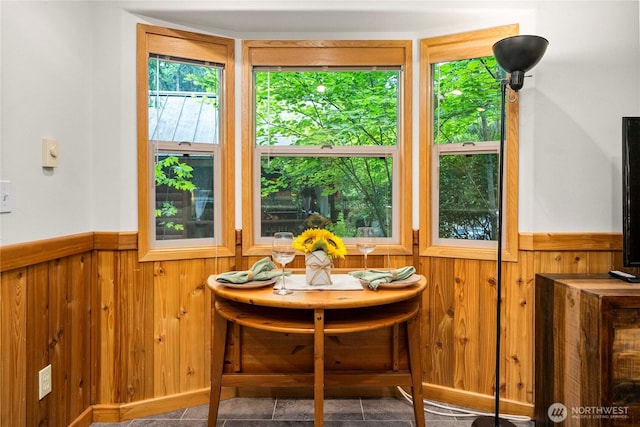 1546 Reservation Rd SE Unit 62, Olympia, WA 98513 - dining area featuring wainscoting and wooden walls