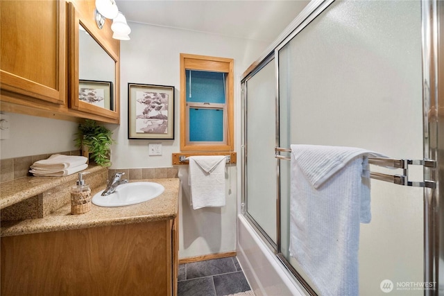 1546 Reservation Rd SE Unit 62, Olympia, WA 98513 - bathroom featuring vanity, tile patterned flooring, and shower / bath combination with glass door
