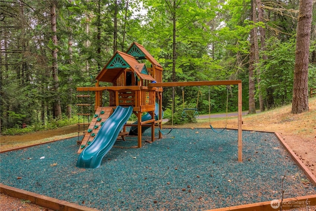 1546 Reservation Rd SE Unit 62, Olympia, WA 98513 - view of playground featuring a forest view