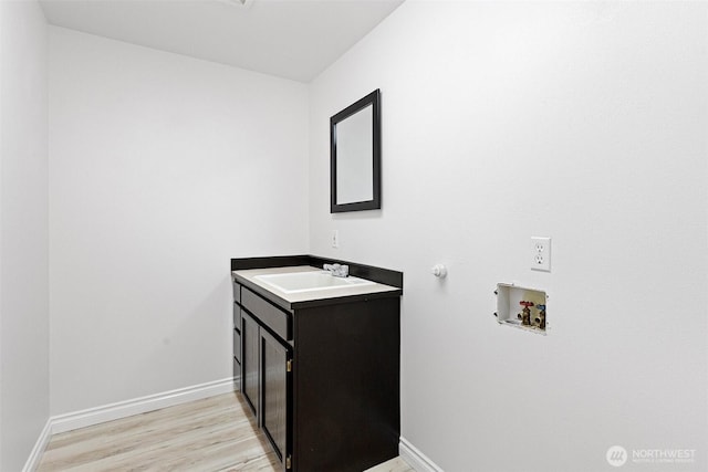 11511 188th St SE, Snohomish, WA 98296 - laundry room with washer hookup, light wood-style flooring, and gas dryer hookup