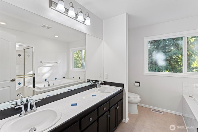 11511 188th St SE, Snohomish, WA 98296 - bathroom with double vanity, a garden tub, tile patterned flooring, and an enclosed shower