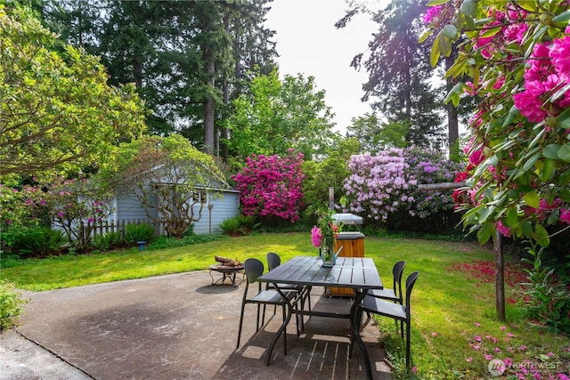 1209 Yew St, Bellingham, WA 98229 - view of patio / terrace featuring outdoor dining area and an outbuilding