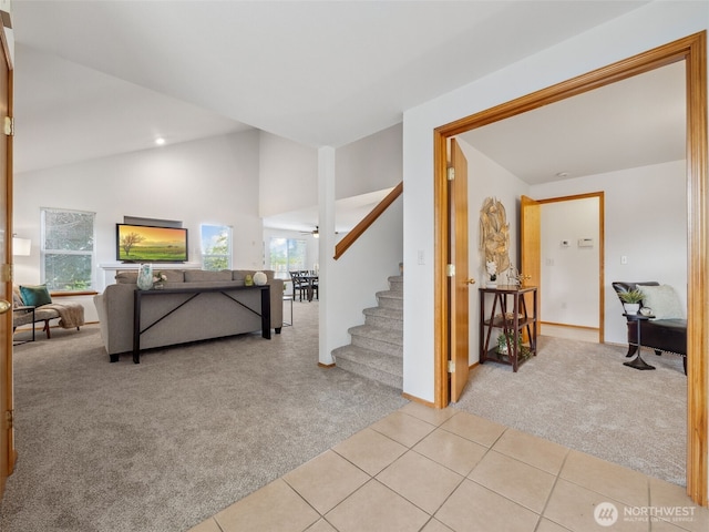 36261 23rd Pl S, Federal Way, WA 98003 - entryway with light colored carpet, stairs, light tile patterned flooring, and high vaulted ceiling