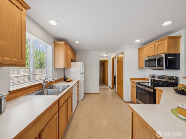 36261 23rd Pl S, Federal Way, WA 98003 - kitchen featuring stainless steel appliances, light countertops, light floors, and recessed lighting