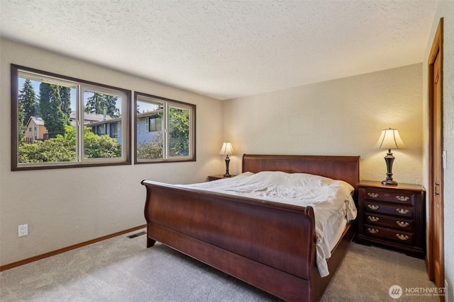 17837 Ashworth Ave N, Shoreline, WA 98133 - carpeted bedroom featuring a textured ceiling and baseboards