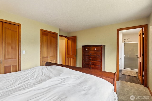 17837 Ashworth Ave N, Shoreline, WA 98133 - bedroom with connected bathroom, a textured ceiling, and a closet