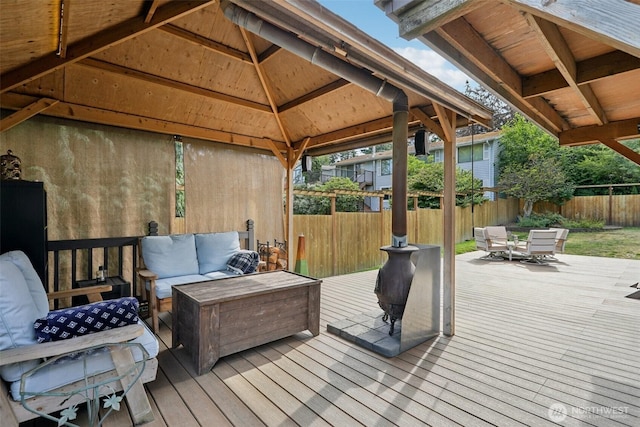 17837 Ashworth Ave N, Shoreline, WA 98133 - deck featuring outdoor dining area, outdoor lounge area, a fenced backyard, and a gazebo