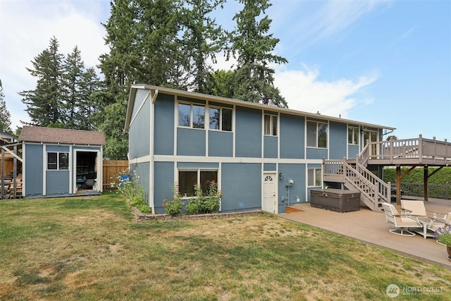 17837 Ashworth Ave N, Shoreline, WA 98133 - back of house with a deck, a patio area, a storage unit, and stairway
