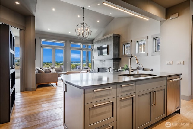 9424 Turnstone Ln Unit 29, Blaine, WA 98230 - kitchen featuring open floor plan, a chandelier, recessed lighting, a kitchen island with sink, and light wood-style flooring
