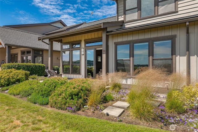 9424 Turnstone Ln Unit 29, Blaine, WA 98230 - back of property with board and batten siding and roof with shingles