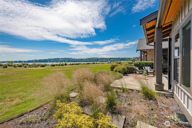 9424 Turnstone Ln Unit 29, Blaine, WA 98230 - view of yard with a patio area and a view of countryside