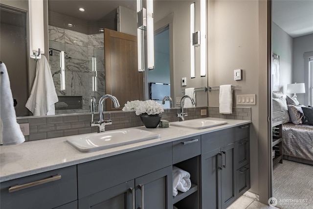 9424 Turnstone Ln Unit 29, Blaine, WA 98230 - bathroom with connected bathroom, double vanity, a stall shower, and backsplash