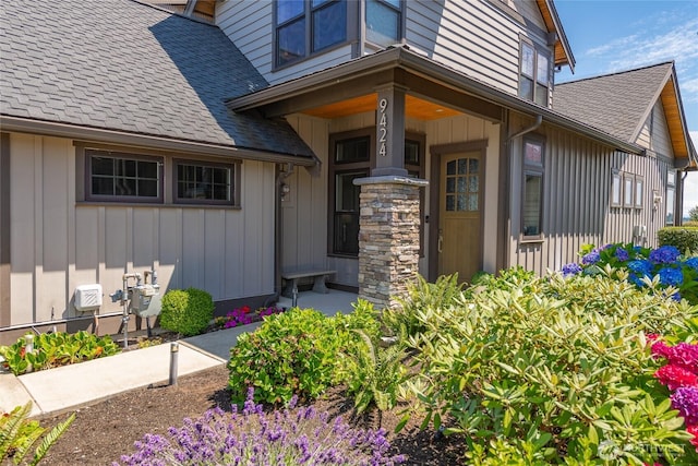 9424 Turnstone Ln Unit 29, Blaine, WA 98230 - entrance to property featuring a shingled roof and board and batten siding