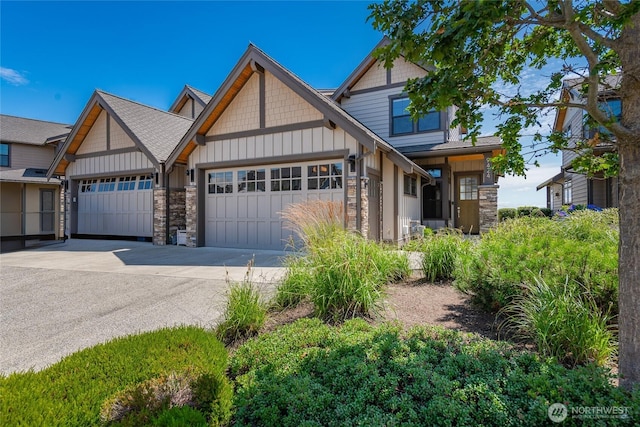 9424 Turnstone Ln Unit 29, Blaine, WA 98230 - craftsman inspired home featuring stone siding, an attached garage, driveway, and board and batten siding