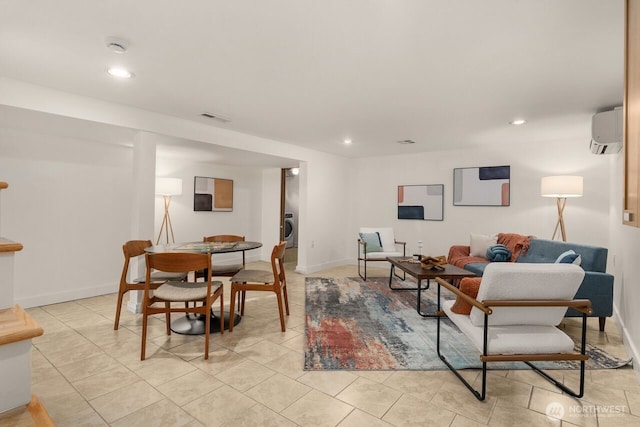 8051 30th Ave NW, Seattle, WA 98117 - living room with a wall mounted air conditioner, recessed lighting, washer / clothes dryer, and light tile patterned flooring