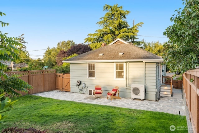 8051 30th Ave NW, Seattle, WA 98117 - back of house featuring a patio area, a fenced backyard, and a shingled roof