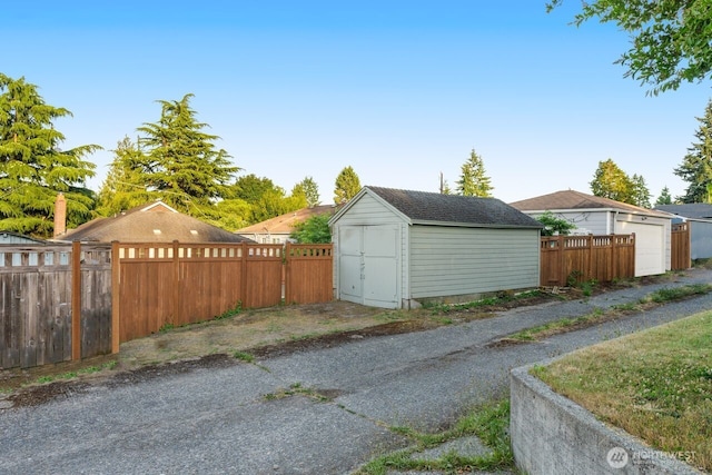 8051 30th Ave NW, Seattle, WA 98117 - garage featuring a storage shed