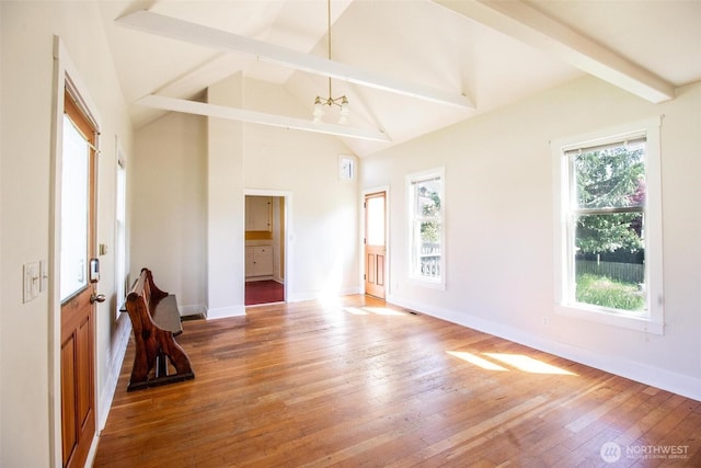 835 J St, Port Townsend, WA 98368 - spare room with light wood-style flooring and a chandelier