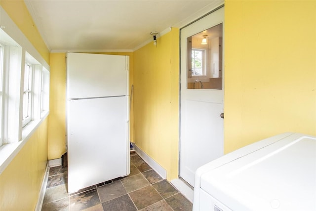 835 J St, Port Townsend, WA 98368 - laundry room with stone finish floors and washer / dryer